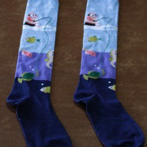 Ice-fishing penguin knee high socks